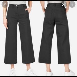 Everlane black wide leg trousers.